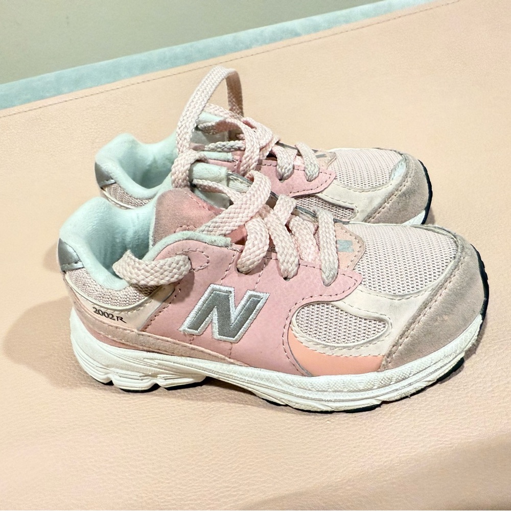 Used New Balance Pink and Silver Sneakers with Supportive Midsole